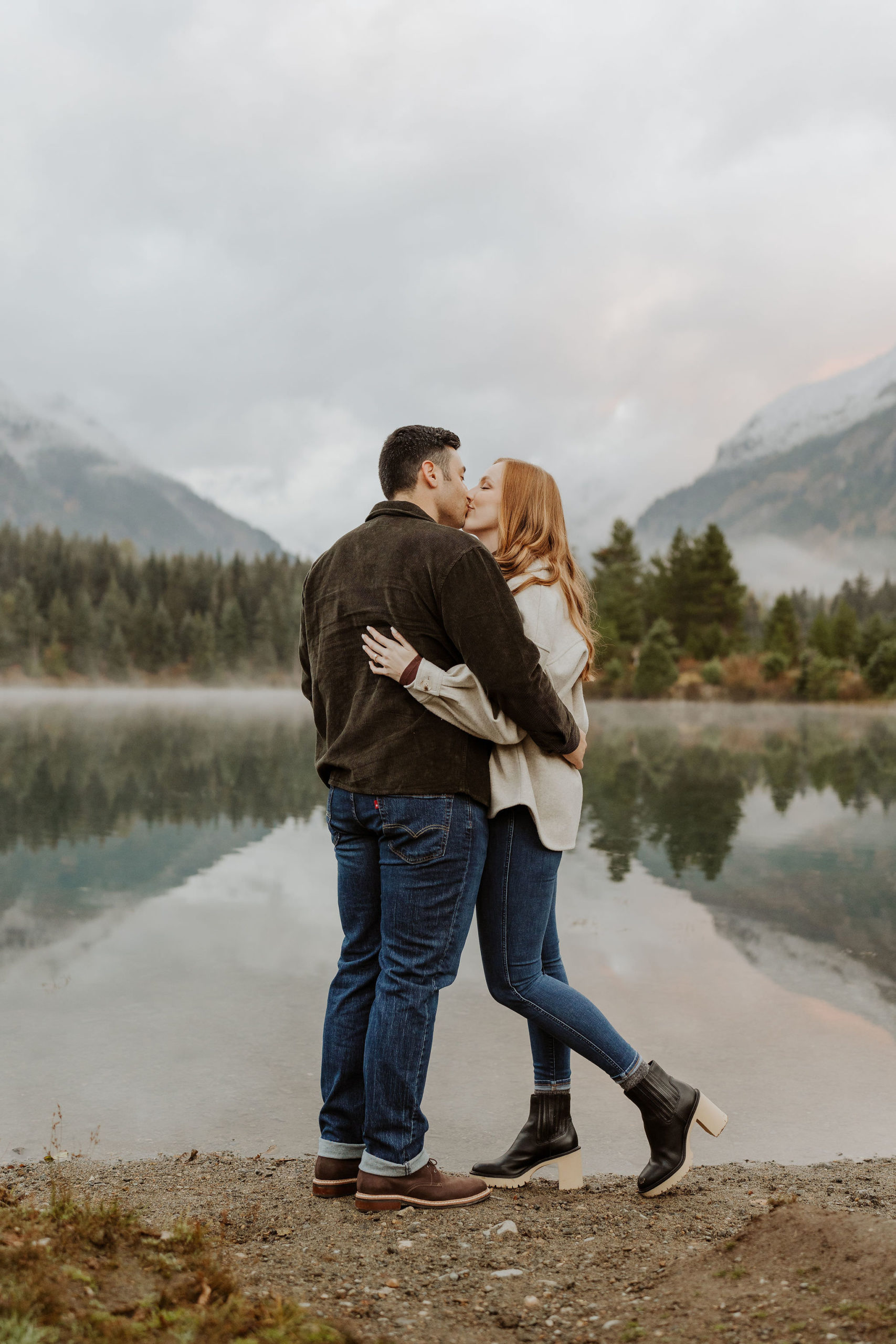 couple hugging and kissing at Gold Creek Pond